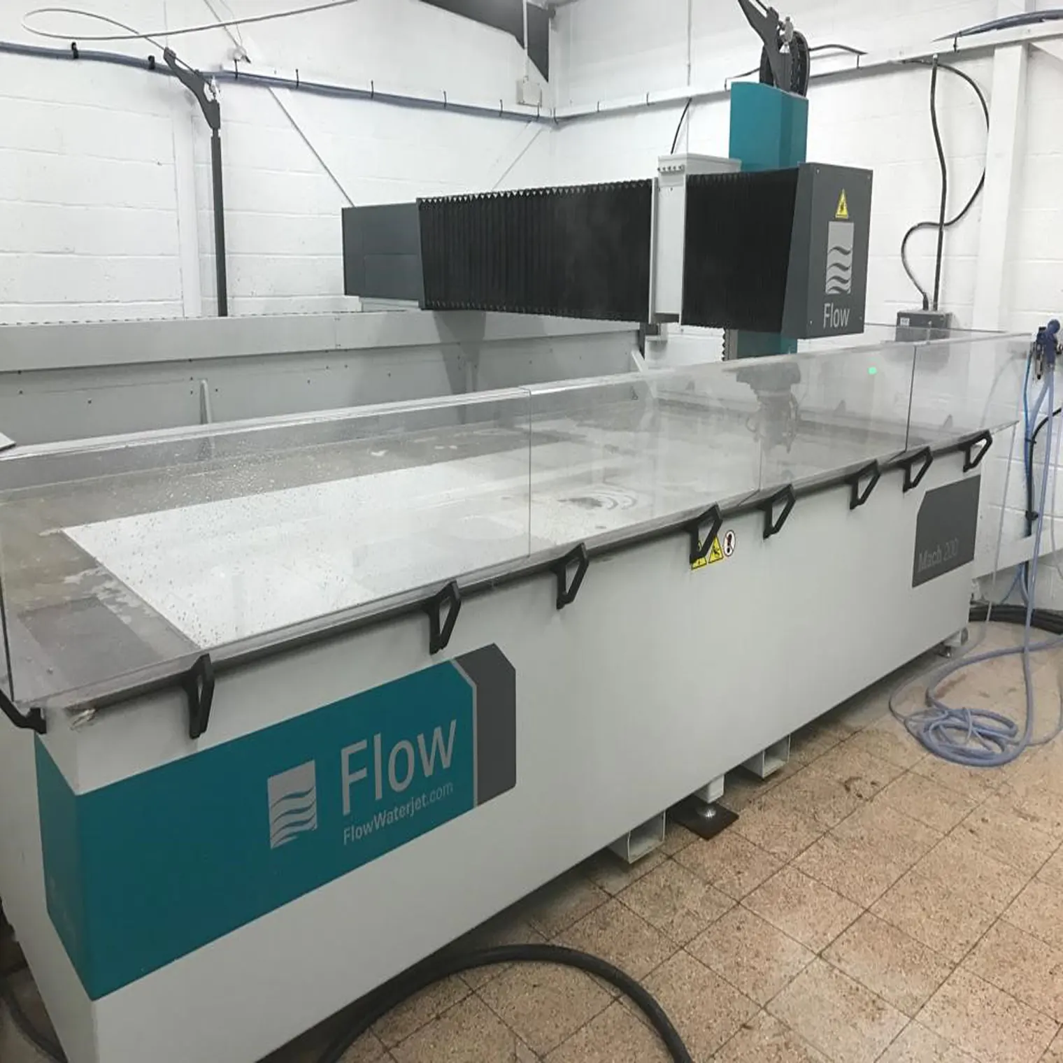 Flow waterjet cutting machine in the Marlborough Granite factory